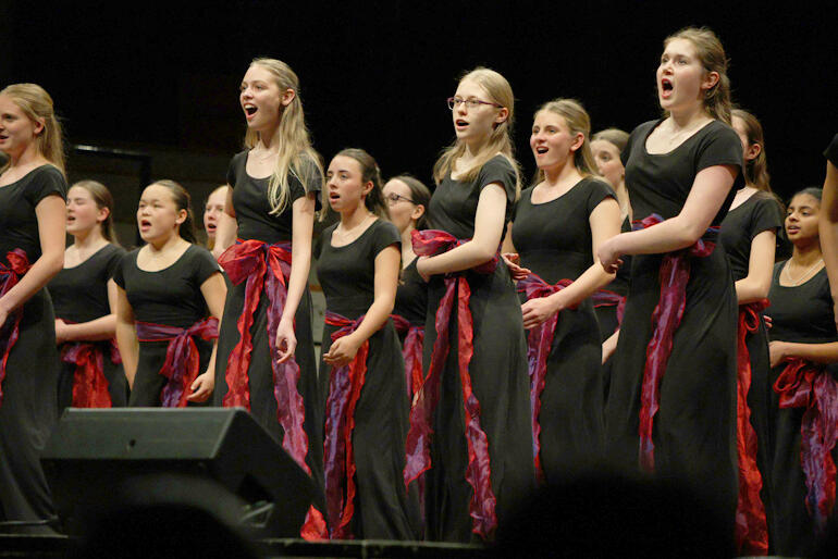 Bel Suono choristers from Waikato Diocesan School for Girls dial up the glamour in 'They Just Keep Moving the Line'. Bel Suono choristers from Waikato Diocesan School for Girls dial up the glamour in 'They Just Keep Moving the Line'.