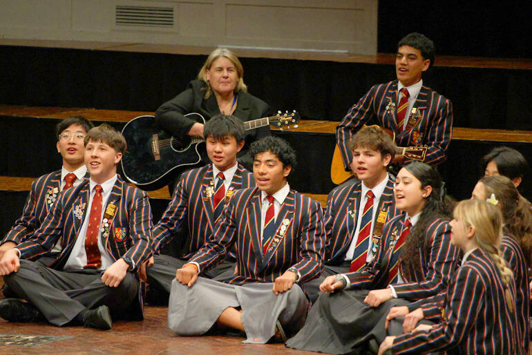 'Kappella' from King's College sing a graduation song composed by Queen Sālote Tupou III of Tonga. 'Kappella' from King's College sing a graduation song composed by Queen Sālote Tupou III of Tonga.