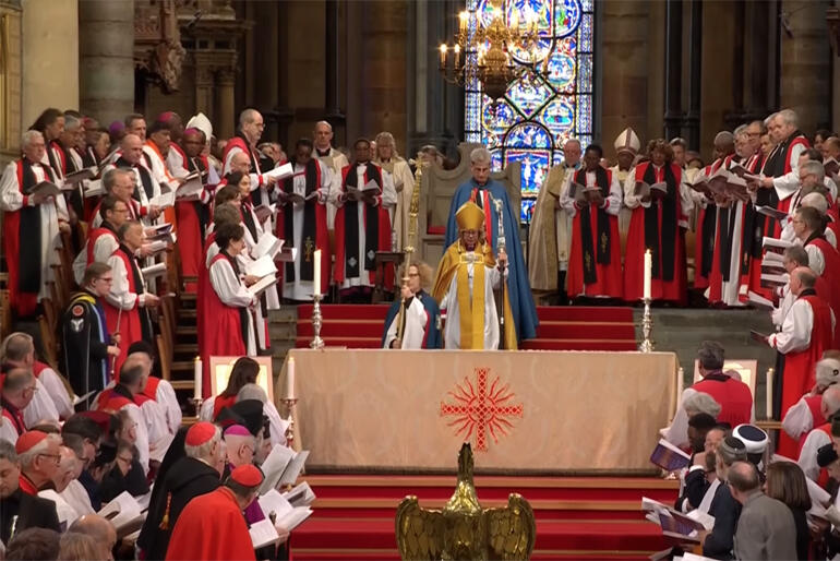 Archbishop Sarah Mullally moves toward the altar following her enthronement.